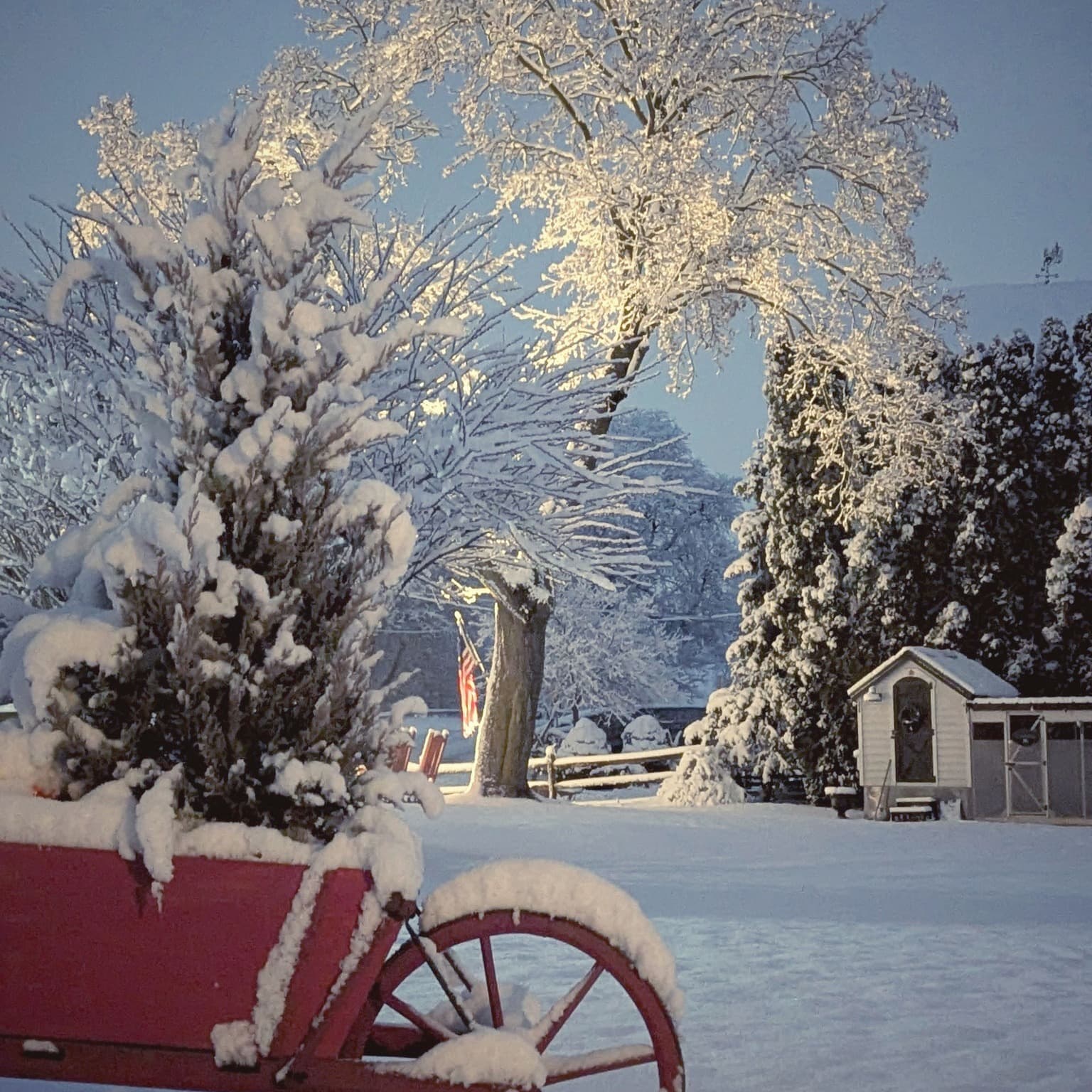 Snow covered view of Osceola Mill House property with wheelbarrow Snow covered view of Osceola Mill House property with wheelbarrow